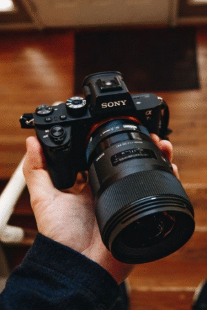 Sony Alpha Mirrorless Camera in Hand (Black)